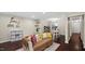 Cozy living space featuring a comfortable sofa and view to the adjacent dining area at 11 Willow Bridge Dr, Durham, NC 27707