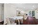 Spacious living room with fireplace, dining area and wood floors at 11 Willow Bridge Dr, Durham, NC 27707