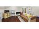 Inviting living room with a cozy fireplace, stylish décor, and dark wood floors at 11 Willow Bridge Dr, Durham, NC 27707