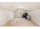 Finished bonus room with a vaulted ceiling and desk set up at 1108 Forest Willow Ln, Morrisville, NC 27560