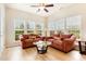 Living room offers bright natural light through large windows, creating an inviting space at 1108 Forest Willow Ln, Morrisville, NC 27560