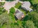 Aerial view showcases a well-maintained home surrounded by mature trees, offering a private and serene backyard oasis at 113 Chestone Ct, Cary, NC 27513