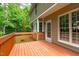 Large wood back deck, attached to the home, overlooks a large backyard space at 113 Chestone Ct, Cary, NC 27513