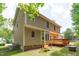The home has a back deck, swing, mature trees, and spacious backyard at 113 Chestone Ct, Cary, NC 27513