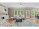 This comfortable living room is filled with natural light, creating a warm and inviting atmosphere at 113 Chestone Ct, Cary, NC 27513