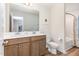 Bathroom featuring double sinks with a large mirror and a shower-tub combination at 124 Airlie Place Ln, Willow Springs, NC 27592