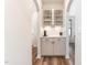 Butler Pantry with display cabinets and tile backsplash at 124 Airlie Place Ln, Willow Springs, NC 27592