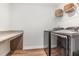 Functional laundry room featuring a granite counter, a utility sink and modern appliances at 124 Airlie Place Ln, Willow Springs, NC 27592