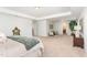 Large main bedroom featuring a seating area and ensuite bath at 124 Airlie Place Ln, Willow Springs, NC 27592