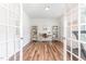 Bright office space with natural light, featuring a desk and shelving units, perfect for work at 124 Airlie Place Ln, Willow Springs, NC 27592