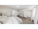 Spacious bedroom with closet space, neutral decor, and carpeted floors at 1537 Piney Fls Dr, Wendell, NC 27591