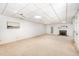 Spacious finished basement with neutral carpet, drop ceiling, and recessed lights at 1547 Village Glenn Dr, Raleigh, NC 27612