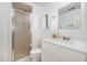 Bathroom features a shower, vanity, mirror, and toilet at 1547 Village Glenn Dr, Raleigh, NC 27612
