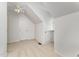 Bedroom features neutral carpet and built-in storage under the eaves at 1547 Village Glenn Dr, Raleigh, NC 27612