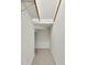 Walk-in closet features painted walls, neutral carpet and hanging racks at 1547 Village Glenn Dr, Raleigh, NC 27612