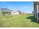 Expansive backyard featuring lush green grass, ideal for outdoor activities and relaxation at 1601 Merry Mdw Way, Wendell, NC 27591