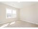 Bright carpeted bedroom with natural light and large windows at 1601 Merry Mdw Way, Wendell, NC 27591