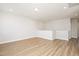Spacious bonus room with hardwood flooring and recessed lighting at 1601 Merry Mdw Way, Wendell, NC 27591