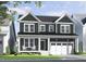 Charming two-story home with a covered front porch, white trim, and a well-manicured lawn at 1601 Merry Mdw Way, Wendell, NC 27591