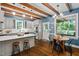 Beautiful kitchen with custom cabinets, stainless appliances, an island and a breakfast nook at 1909 Ira Rd, Efland, NC 27243