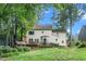 Expansive backyard featuring a spacious deck ideal for outdoor entertaining and leisure at 203 W Hill Dr, Cary, NC 27519