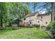 Expansive backyard featuring a spacious deck ideal for outdoor entertaining and leisure at 203 W Hill Dr, Cary, NC 27519