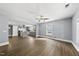 Spacious living room area with an open floor plan and modern ceiling fan at 208 Maywood Ave, Raleigh, NC 27603