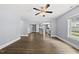 Bright living room with hardwood floors, blue walls, and an open floor plan at 208 Maywood Ave, Raleigh, NC 27603