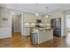 Kitchen featuring granite counters, a kitchen island, and stainless steel appliances at 21 Boots Dr, Angier, NC 27501
