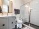 Bathroom featuring a glass shower with white subway tiles at 2125 Pine Dr, Raleigh, NC 27608