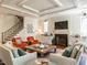 Bright living room with fireplace, comfortable seating, and an open layout at 2125 Pine Dr, Raleigh, NC 27608