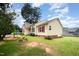 Charming single-Gathering home with a red front door and well maintained lawn at 220 Needle Park Dr, Cary, NC 27513