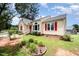 Charming single-Gathering home with a red front door and well maintained lawn at 220 Needle Park Dr, Cary, NC 27513