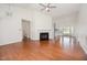 Spacious room with hardwood floors, fire place and lots of natural light at 220 Needle Park Dr, Cary, NC 27513
