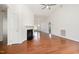 Bright living room with hardwood floors, fireplace, and vaulted ceiling at 220 Needle Park Dr, Cary, NC 27513