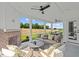 Inviting covered porch with fireplace and comfortable outdoor seating at 222 Faith Avenue, Sanford, NC 27330