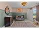 Charming Bedroom with crib, rocking horse, and neutral decor at 223 Faith Avenue, Sanford, NC 27330