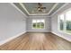 Spacious bedroom with beautiful windows and hardwood flooring for a bright and airy feel at 2493 Nc-242, Benson, NC 27504