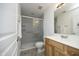 This full bathroom boasts a vanity with lots of room and a shower with glass doors at 25 Ruth Cir, Fuquay Varina, NC 27526