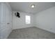 Neutral bedroom with carpeted floor and tv at 25 Ruth Cir, Fuquay Varina, NC 27526