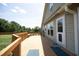 Spacious wooden deck with built-in benches, perfect for outdoor entertaining at 25 Ruth Cir, Fuquay Varina, NC 27526