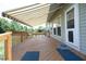 Wooden deck, with outdoor awning, ready for relaxing or entertaining at 25 Ruth Cir, Fuquay Varina, NC 27526