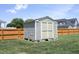 Backyard shed on concrete blocks, offering additional storage at 25 Ruth Cir, Fuquay Varina, NC 27526