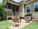 Backyard patio with outdoor grill, fire pit, and screened porch access for entertaining at 3021 Lawson Walk Way, Rolesville, NC 27571