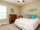 Inviting bedroom with a cozy atmosphere, plush carpet, and soft lighting, perfect for relaxation at 3021 Lawson Walk Way, Rolesville, NC 27571