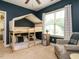 bedroom featuring a bunk bed with canopy, chair, window and blue painted walls at 3021 Lawson Walk Way, Rolesville, NC 27571
