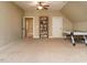Spacious game room featuring a pool table, bookshelf, and neutral carpet at 3021 Lawson Walk Way, Rolesville, NC 27571