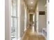 Hallway with lots of natural light coming through the windows, and plenty of storage at 3021 Lawson Walk Way, Rolesville, NC 27571