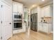 Gourmet kitchen featuring stainless steel appliances and ample cabinet space at 3021 Lawson Walk Way, Rolesville, NC 27571