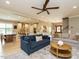 Spacious open-concept living room flows into the dining area and kitchen, creating an ideal space for entertaining at 3021 Lawson Walk Way, Rolesville, NC 27571